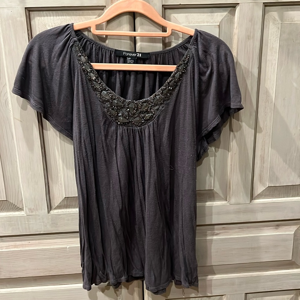 Dark grey, loose fit top, with beaded neckline